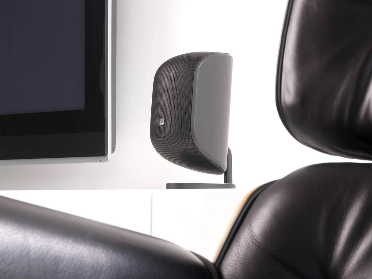 The Bowers & Wilkins M-1 satellite speaker on a shelf