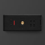 Marshall Middleton II Black and Brass, a stylish black rectangular Bluetooth speaker with a gold button, red indicator, two sliders, and USB port, is shown on a dark background.