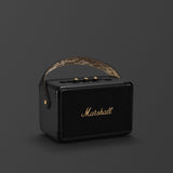 Kilburn II Black and Brass, a Marshall bluetooth speaker in black with a leather strap.