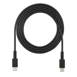 A coiled black USB-C to USB-C cable on a solid white background.