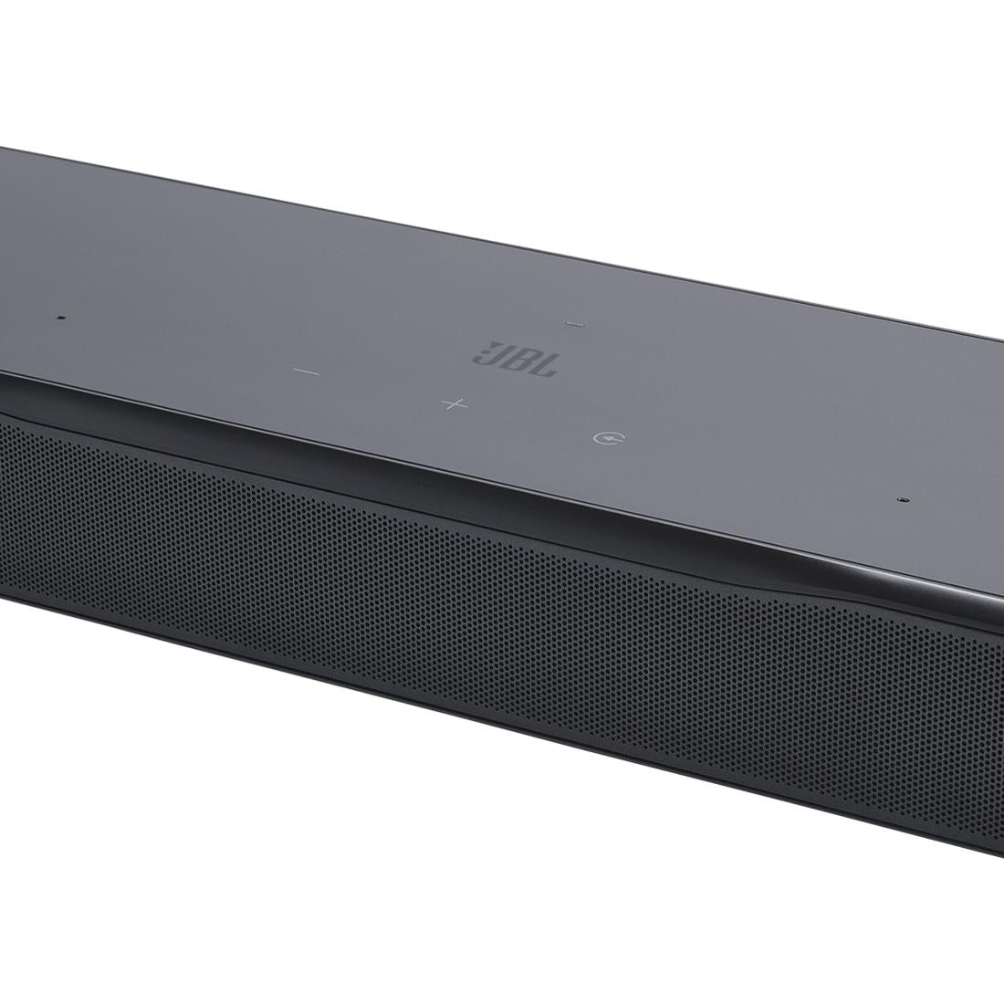 Close-up of touch controls on black JBL Bar 700 soundbar on a white background