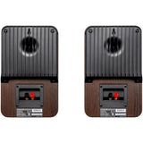 Pair of brown Polk ES15 speakers from rear showing keyhole slots and terminals