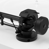 Close-up of Pro-Ject X2 B tonearm, anti-skating, and counterweight