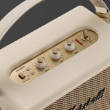 Marshall Kilburn III Cream portable Bluetooth speaker featuring a mesh grille, gold logo, top control knobs, and a leather carrying strap.