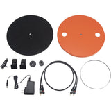 Set of JBL Spinner BT components including platter and felt mat, cables, and headshell and cartridge