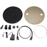 Set of JBL Spinner BT included accessories including platter and felt mat, cables, and headshell and cartridge