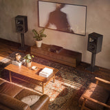 Klipsch Rebellion BK with TV and amplifier in sunny living room