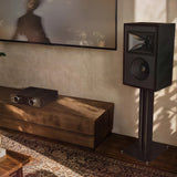Klipsch Rebellion BK grilles off in sunny living room beside amplifier