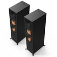 Two ebony Klipsch Reference Premiere III floorstanding speakers with wood-grain finish and copper-hued Cerametallic woofers, shown on a clean white background.
