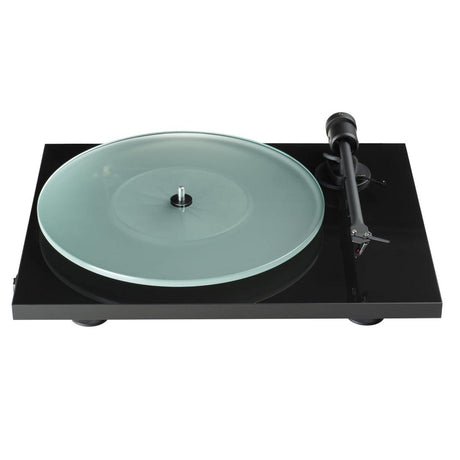 Turntable with green platter on a white background